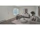 Cozy living room features plush seating, modern decor, and ample natural light through large windows at 2565 S Sheridan Blvd # 14, Lakewood, CO 80227