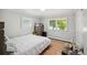 Well-lit bedroom with hardwood floors and ample closet space at 4360 S Alton Ct, Greenwood Village, CO 80111