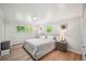 Main bedroom with hardwood floors and neutral color scheme at 4360 S Alton Ct, Greenwood Village, CO 80111