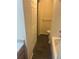 Bathroom with white shower-tub combination, modern toilet, and wood vanity at 6240 Everett Ct # D, Arvada, CO 80004