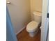 Bathroom with modern toilet and wood-look vinyl flooring at 6240 Everett Ct # D, Arvada, CO 80004