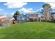 Spacious backyard with a lush lawn and patio at 7193 S Newport Way, Centennial, CO 80112