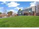 Spacious backyard with a lush lawn and patio at 7193 S Newport Way, Centennial, CO 80112