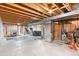 Unfinished basement with exposed ductwork at 7193 S Newport Way, Centennial, CO 80112