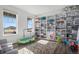 Playful ' room with built-in shelving and colorful rug at 13267 E 108Th Ave, Commerce City, CO 80022