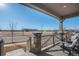 Front porch with seating, view of neighborhood and school at 13267 E 108Th Ave, Commerce City, CO 80022