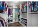 Large walk-in closet with ample shelving and hanging space at 13267 E 108Th Ave, Commerce City, CO 80022