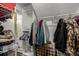 Well-organized walk-in closet with shelving and hanging racks at 4555 E 121St Ct, Thornton, CO 80241