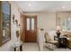 Inviting entryway features a decorative front door, tile flooring, and stylish decor at 4555 E 121St Ct, Thornton, CO 80241