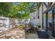 Private outdoor patio with dining table and chairs, perfect for relaxing and entertaining at 7250 Eastmoor Dr # 122, Denver, CO 80237