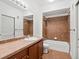 Cozy bathroom showing the sink, toilet and bathtub shower combination at 9019 E Panorama Cir # D320, Englewood, CO 80112