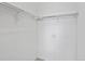 Walk-in closet offering a simple and functional storage solution at 9019 E Panorama Cir # D320, Englewood, CO 80112