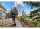 Backyard view with stone path and deck at 2330 Sandpiper Dr, Lafayette, CO 80026