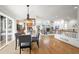 Bright dining area flows into the kitchen and living room, creating an inviting open space concept at 2330 Sandpiper Dr, Lafayette, CO 80026