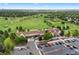 Overhead shot of clubhouse, golf course, and parking at 9871 Indian Wells Dr, Lone Tree, CO 80124