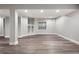 Finished basement with durable flooring and ample space, perfect for a recreation room at 9871 Indian Wells Dr, Lone Tree, CO 80124