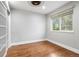 Bedroom with hardwood floors, natural light and neutral paint; ready for you to make it your own! at 9871 Indian Wells Dr, Lone Tree, CO 80124