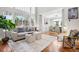Comfortable living room with hardwood floors, a neutral color palette, and an open layout at 9871 Indian Wells Dr, Lone Tree, CO 80124