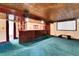 Finished basement featuring wet bar, recessed lighting, and ample space for recreation and entertainment at 15740 Sandtrap Way, Morrison, CO 80465