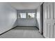 Cozy bedroom with carpet, two windows, and a closet, offering a comfortable living space at 15740 Sandtrap Way, Morrison, CO 80465