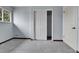 Bright bedroom with carpet, a window, and a closet, providing a versatile space at 15740 Sandtrap Way, Morrison, CO 80465