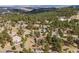 Aerial view of real estate nestled in lush greenery at 23785 Currant Dr, Golden, CO 80401