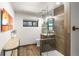Modern bathroom with glass shower, sleek vanity, and stylish fixtures at 23785 Currant Dr, Golden, CO 80401
