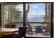 Mountain views from the outdoor deck with modern outdoor seating at 23785 Currant Dr, Golden, CO 80401