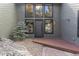 Stylish home entrance with stone accents and modern lighting at 23785 Currant Dr, Golden, CO 80401