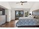 Main bedroom featuring hardwood floors and a door to the outside balcony at 23785 Currant Dr, Golden, CO 80401