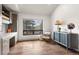 Home office with built-in storage, hardwood floors, and mountain views at 23785 Currant Dr, Golden, CO 80401