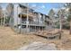 Back view of house with large wooden decks at 23785 Currant Dr, Golden, CO 80401