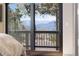 Mountain view from the bedroom, visible through sliding glass doors at 23785 Currant Dr, Golden, CO 80401