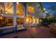 Back deck with outdoor seating and grill, perfect for relaxing and entertaining, with string lights at 7954 S Franklin Ct, Centennial, CO 80122