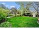 Backyard with grass, storage shed, fencing and landscaping at 7954 S Franklin Ct, Centennial, CO 80122