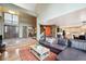 Welcoming entryway boasting a high ceiling, double doors and leading to the kitchen and staircase at 7954 S Franklin Ct, Centennial, CO 80122