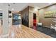 Hallway with wood floors leading to a Sauna at 16541 W 48Th Ln, Golden, CO 80403