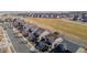 Long aerial shot of houses near a park or green space in the neighborhood at 16404 E 117Th Ave, Commerce City, CO 80022