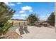 Backyard with concrete patio, green space and seating area with outdoor grill at 16404 E 117Th Ave, Commerce City, CO 80022
