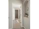Hallway leading to bathroom with walk-in shower at 16404 E 117Th Ave, Commerce City, CO 80022