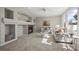 Cozy living room featuring a fireplace and built-in shelving providing an inviting and comfortable atmosphere at 16404 E 117Th Ave, Commerce City, CO 80022