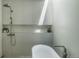 Bright bathroom with a standing shower and modern fixtures at 2627 W 40Th Ave, Denver, CO 80211