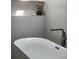 Close-up on bathtub in bright and modern bathroom at 2627 W 40Th Ave, Denver, CO 80211