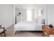 Serene bedroom with white four-poster bed and minimalist decor at 2627 W 40Th Ave, Denver, CO 80211