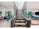 Open staircase with natural light connecting living spaces and creating a bright, airy ambiance at 2627 W 40Th Ave, Denver, CO 80211