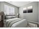 Bedroom featuring neutral walls, carpet, and a comfortable bed with an bedside lamps at 4128 Castle Vista Ln, Castle Rock, CO 80104