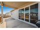 Covered patio with large sliding glass doors that lead inside at 4128 Castle Vista Ln, Castle Rock, CO 80104