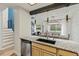 View of the updated kitchen with granite counters and open layout to the dining room at 14252 E Radcliff Cir, Aurora, CO 80015
