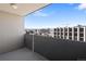 Balcony with a view of the city skyline on a clear day at 909 N Logan St # 10C, Denver, CO 80203