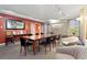 Spacious dining room with a large wooden table and comfortable seating, perfect for entertaining guests at 909 N Logan St # 10C, Denver, CO 80203
